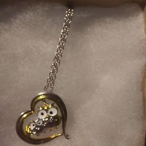 Owl necklace. Gold and silver